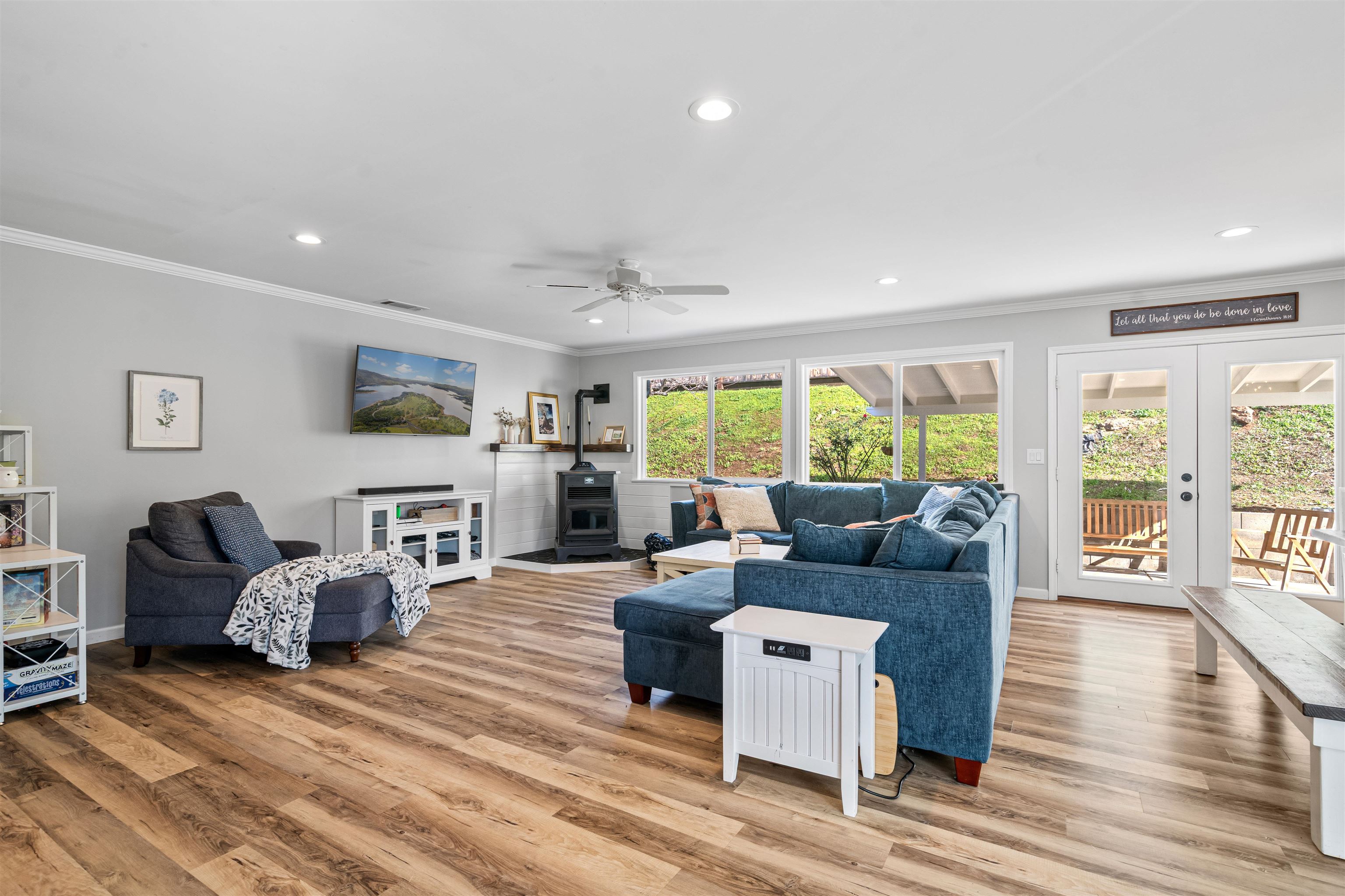 3281 Dunn Road Valley Springs, CA 95252 - Photo 9 of 59 Living room featuring crown molding, french doors, light wood-style flooring, recessed lighting, and a ceiling fan