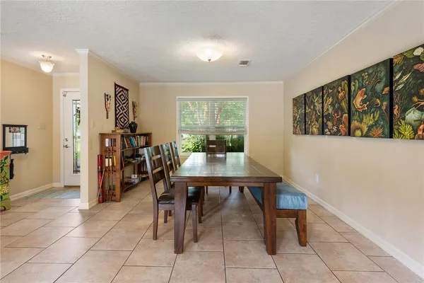 a view of a dining room with furniture
