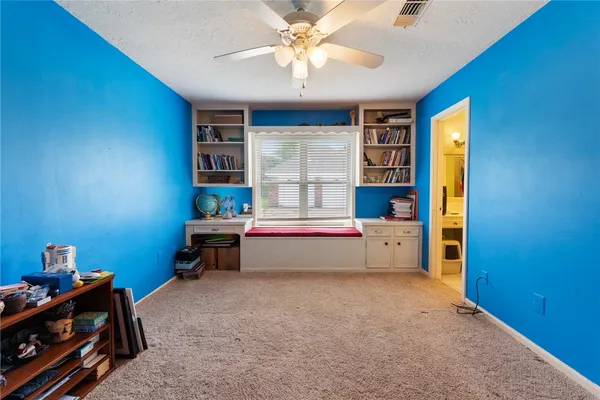 a room with furniture and window