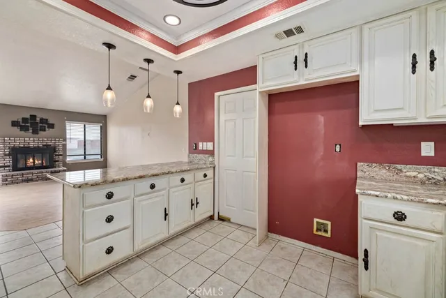 a bathroom with a sink a vanity and a mirror