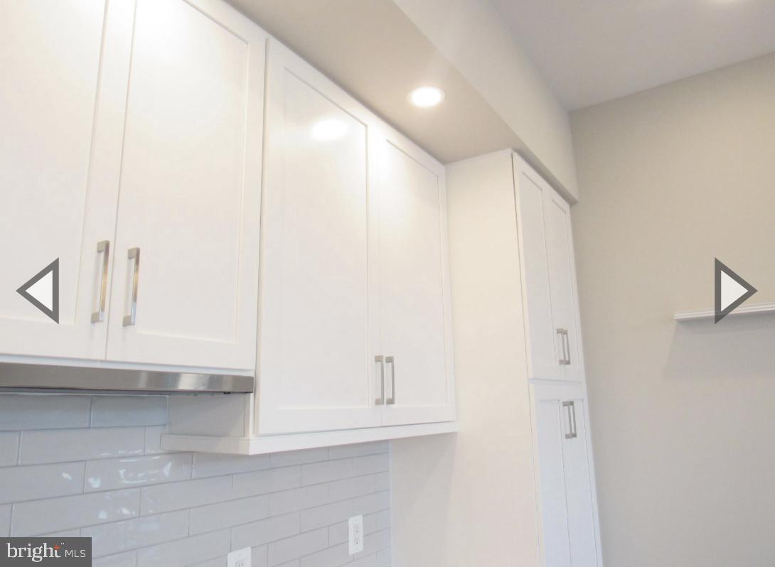 2 Stationmaster Street Southeast, Unit 302 Leesburg, VA 20175 - Photo 14 of 57 White Cabinets
