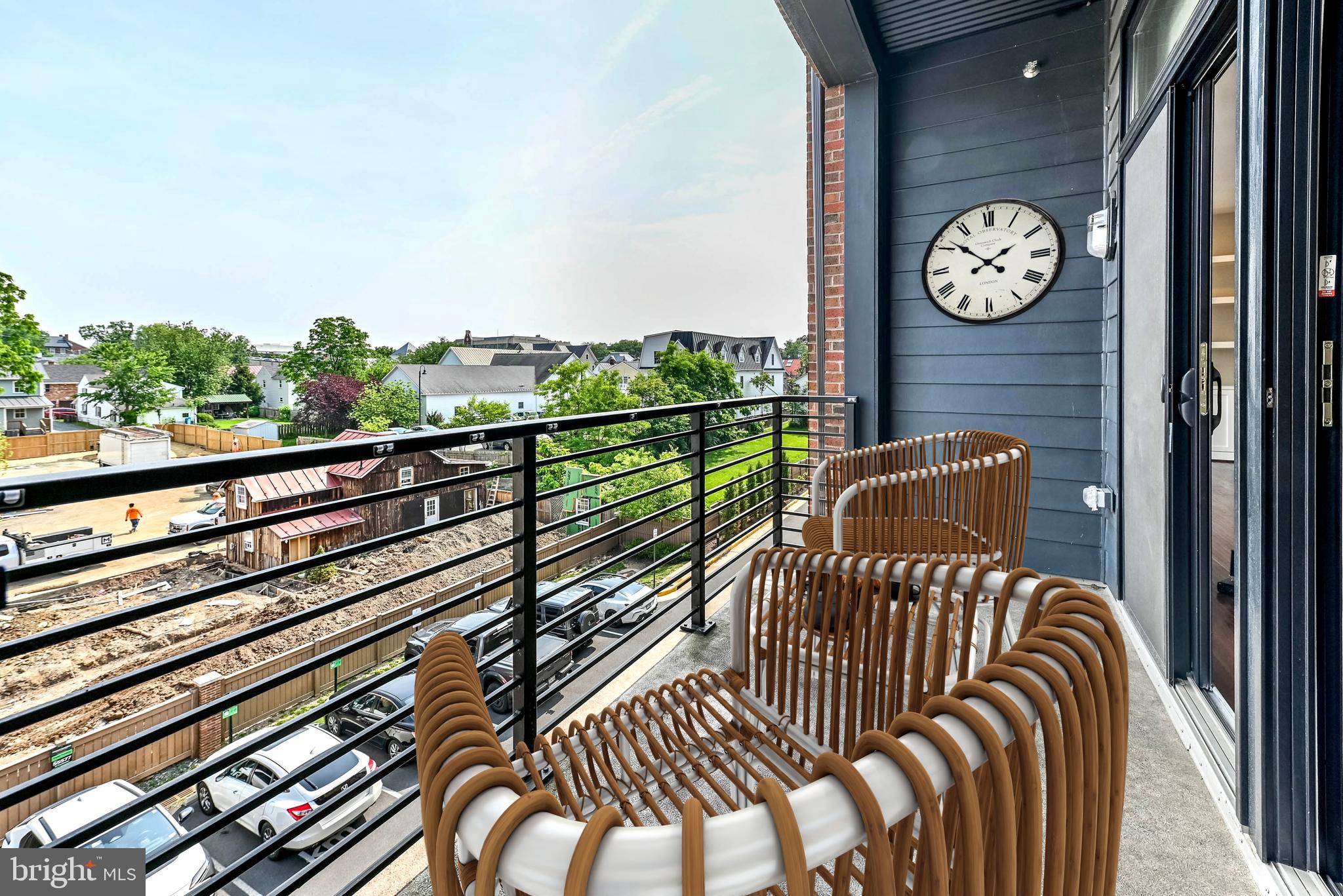 2 Stationmaster Street Southeast, Unit 302 Leesburg, VA 20175 - Photo 38 of 57 a view of a balcony with an outdoor space