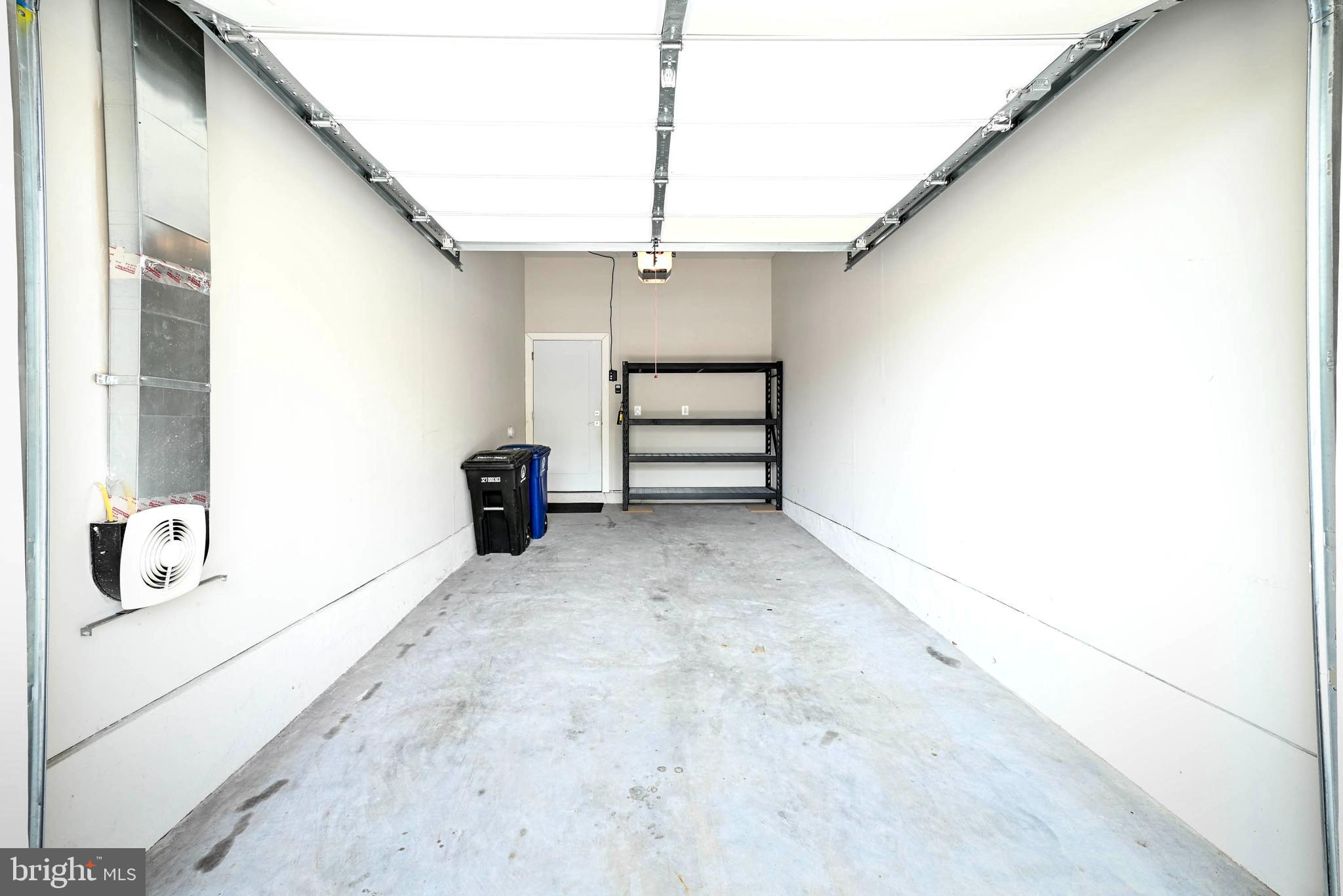 2 Stationmaster Street Southeast, Unit 302 Leesburg, VA 20175 - Photo 44 of 57 a view of a hallway with seating space
