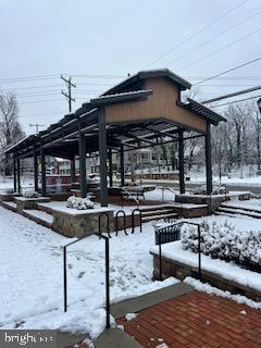 2 Stationmaster Street Southeast, Unit 302 Leesburg, VA 20175 - Photo 54 of 57 a view of a chairs and table on the terrace