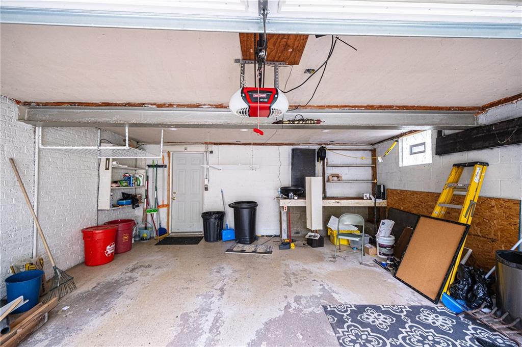 808 Jefferson Road Pittsburgh, PA 15235 - Photo 23 of 25 Large garage with plenty of space for tools and a car