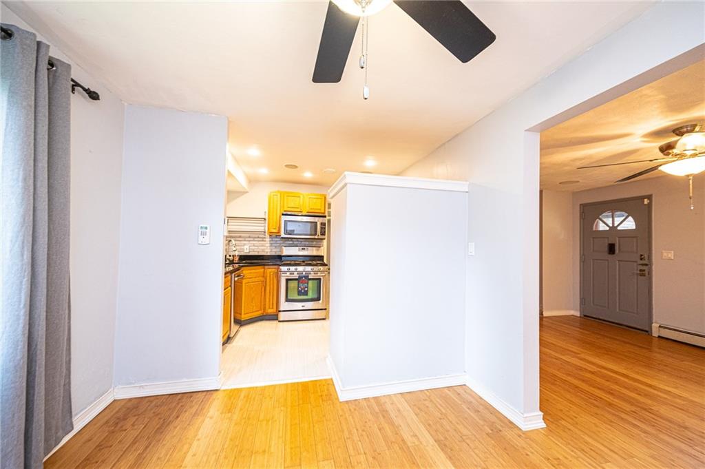 808 Jefferson Road Pittsburgh, PA 15235 - Photo 6 of 25 View of dining room into the kitchen complete with Ceiling fan and bamboo flooring