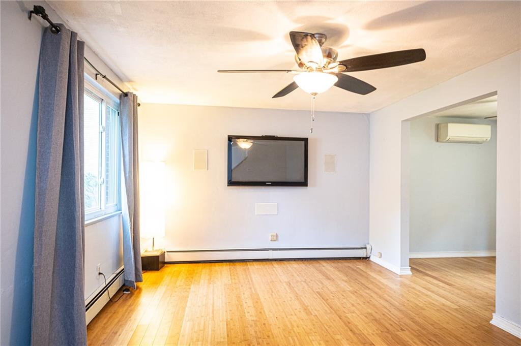808 Jefferson Road Pittsburgh, PA 15235 - Photo 8 of 25 right inside the front door you will find the living room with built in speakers and bamboo flooring