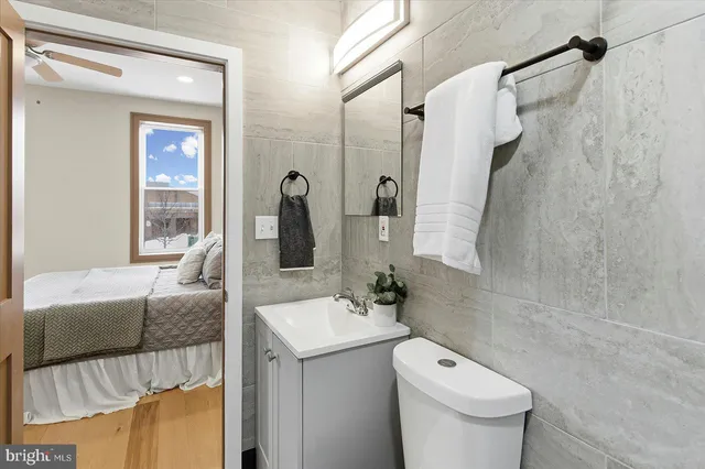 a view of a balcony with wooden floor