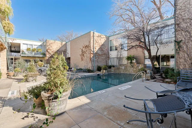a view of backyard with outdoor seating