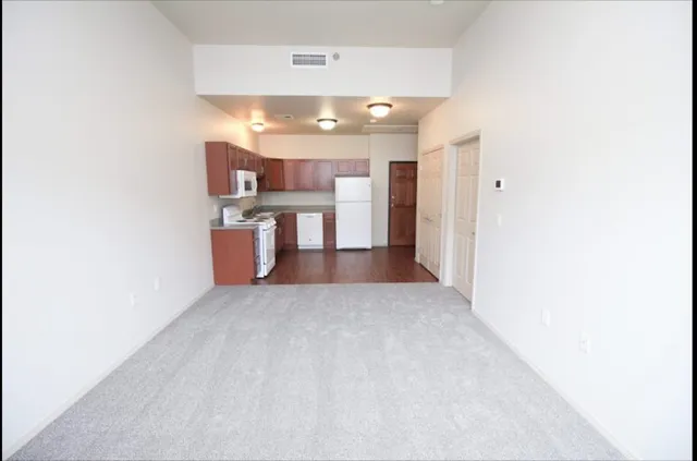 a view of a kitchen with a sink