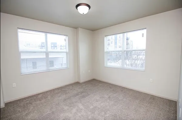 an empty room with windows