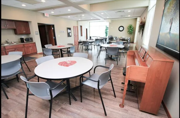 a view of a dining room with furniture