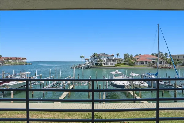 a view of a lake from a balcony