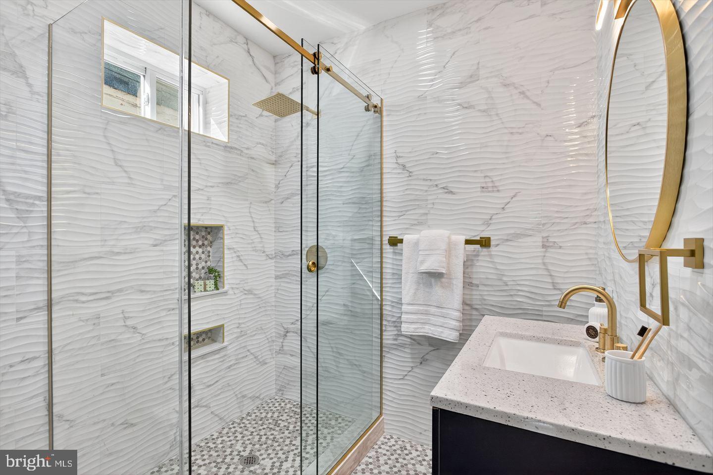 1222 South 26th Street Philadelphia, PA 19146 - Photo 15 of 31 a bathroom with a sink and a shower