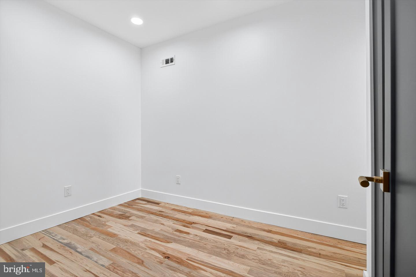 1222 South 26th Street Philadelphia, PA 19146 - Photo 17 of 31 a view of a room with wooden floor