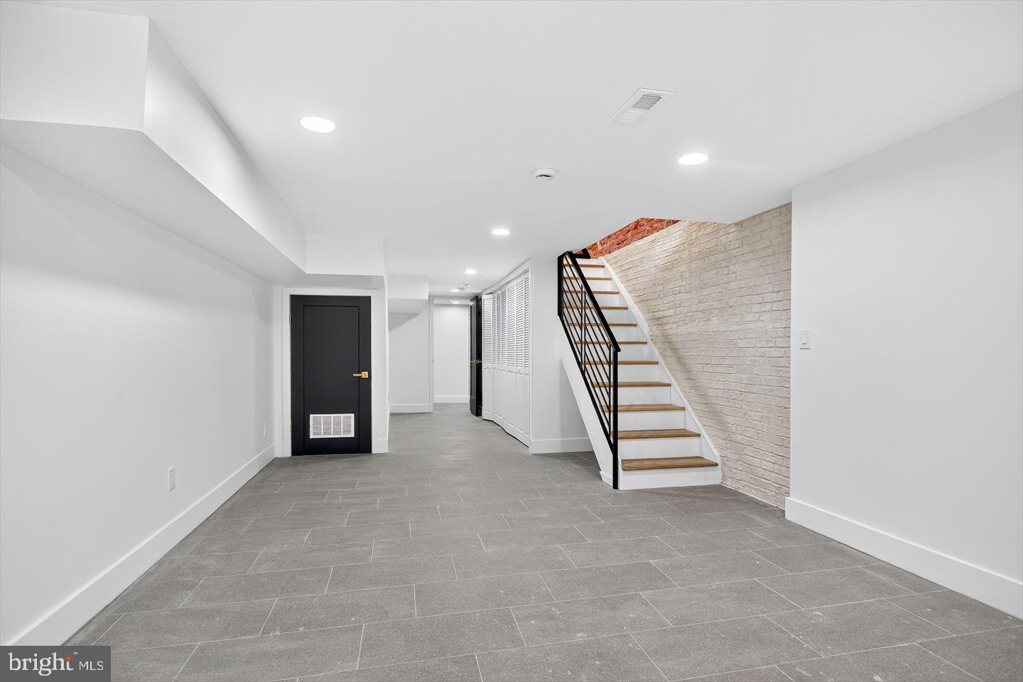 1222 South 26th Street Philadelphia, PA 19146 - Photo 22 of 31 an empty room with white walls and white walls