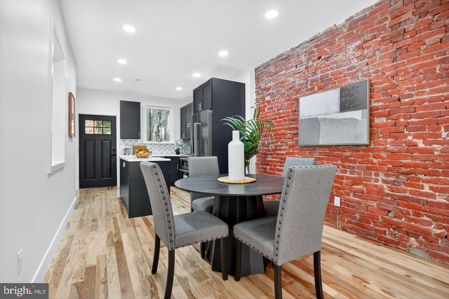 1222 South 26th Street Philadelphia, PA 19146 - Photo 4 of 31 a dining room with furniture and wooden floor