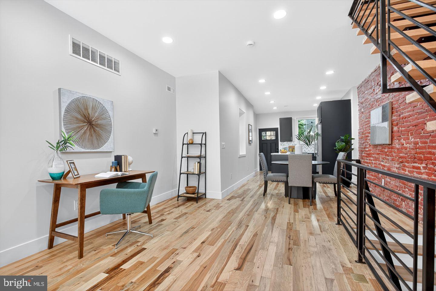 1222 South 26th Street Philadelphia, PA 19146 - Photo 6 of 31 a living room with furniture and a wooden floor