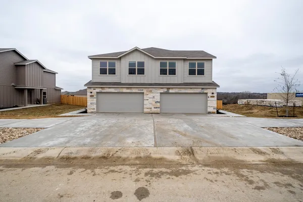 a view of a house with a outdoor space