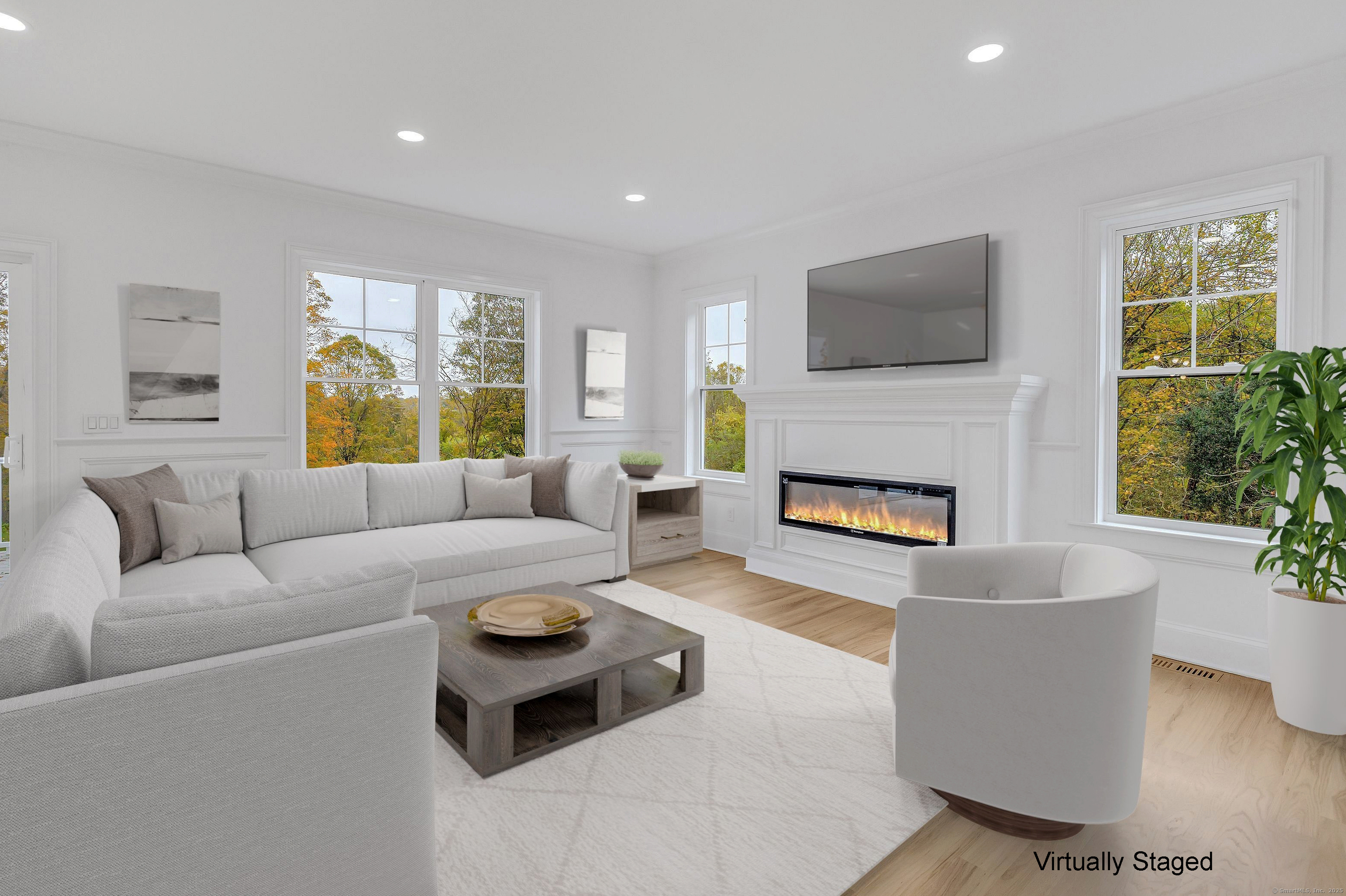 128 Barn Hill Road Monroe, CT 06468 - Photo 13 of 40 a living room with furniture and a fireplace