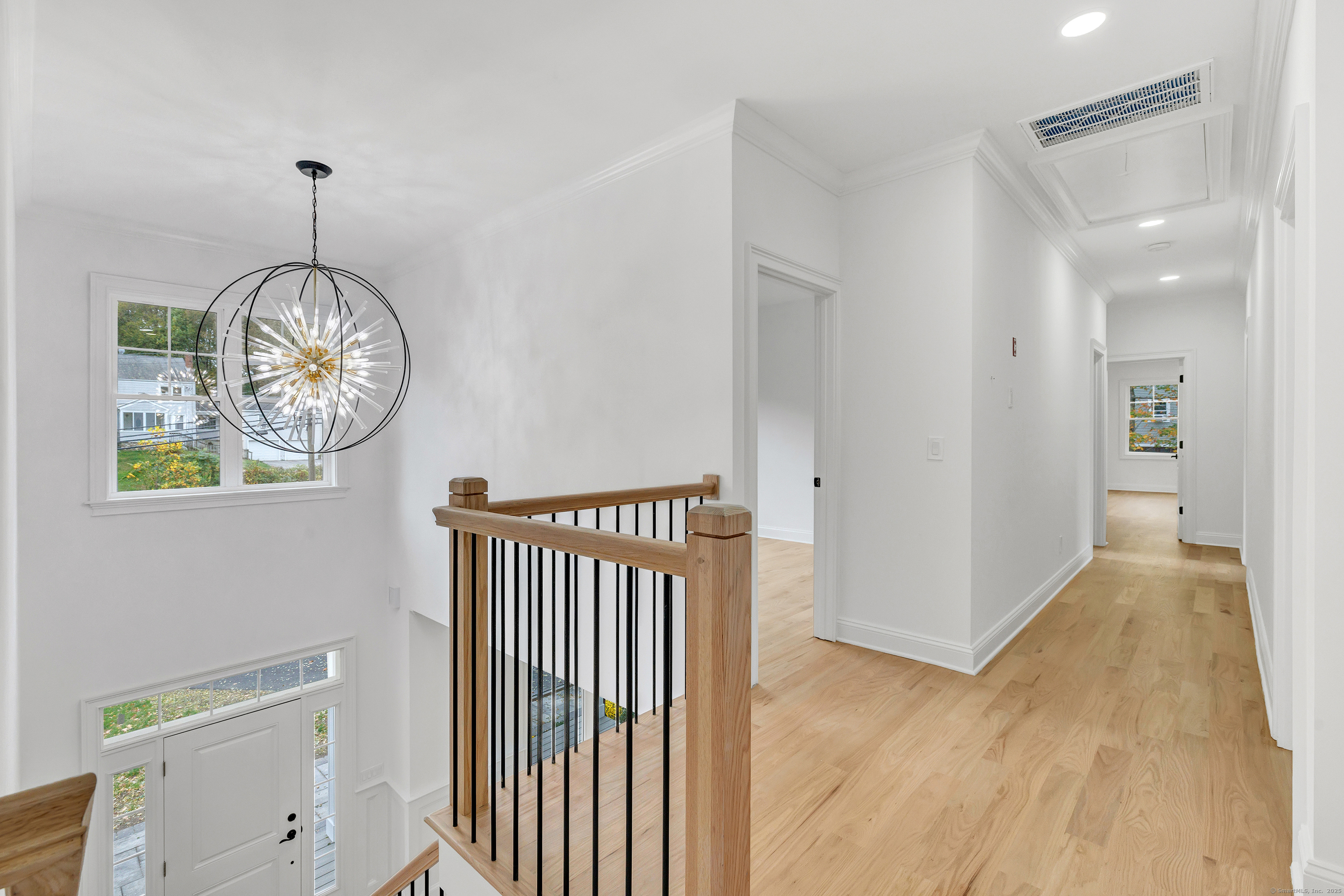 128 Barn Hill Road Monroe, CT 06468 - Photo 21 of 40 a view of an entryway with wooden floor