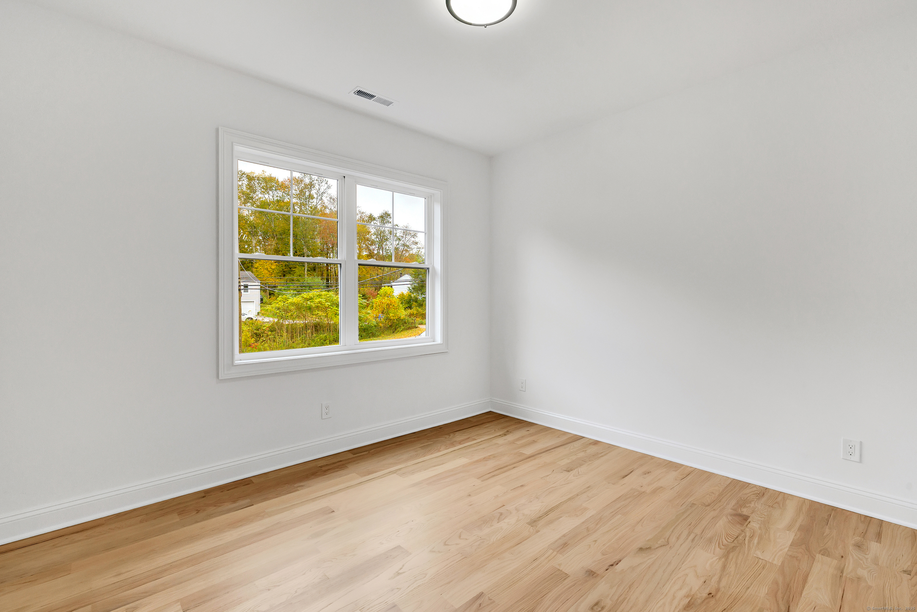 128 Barn Hill Road Monroe, CT 06468 - Photo 27 of 40 an empty room with a window