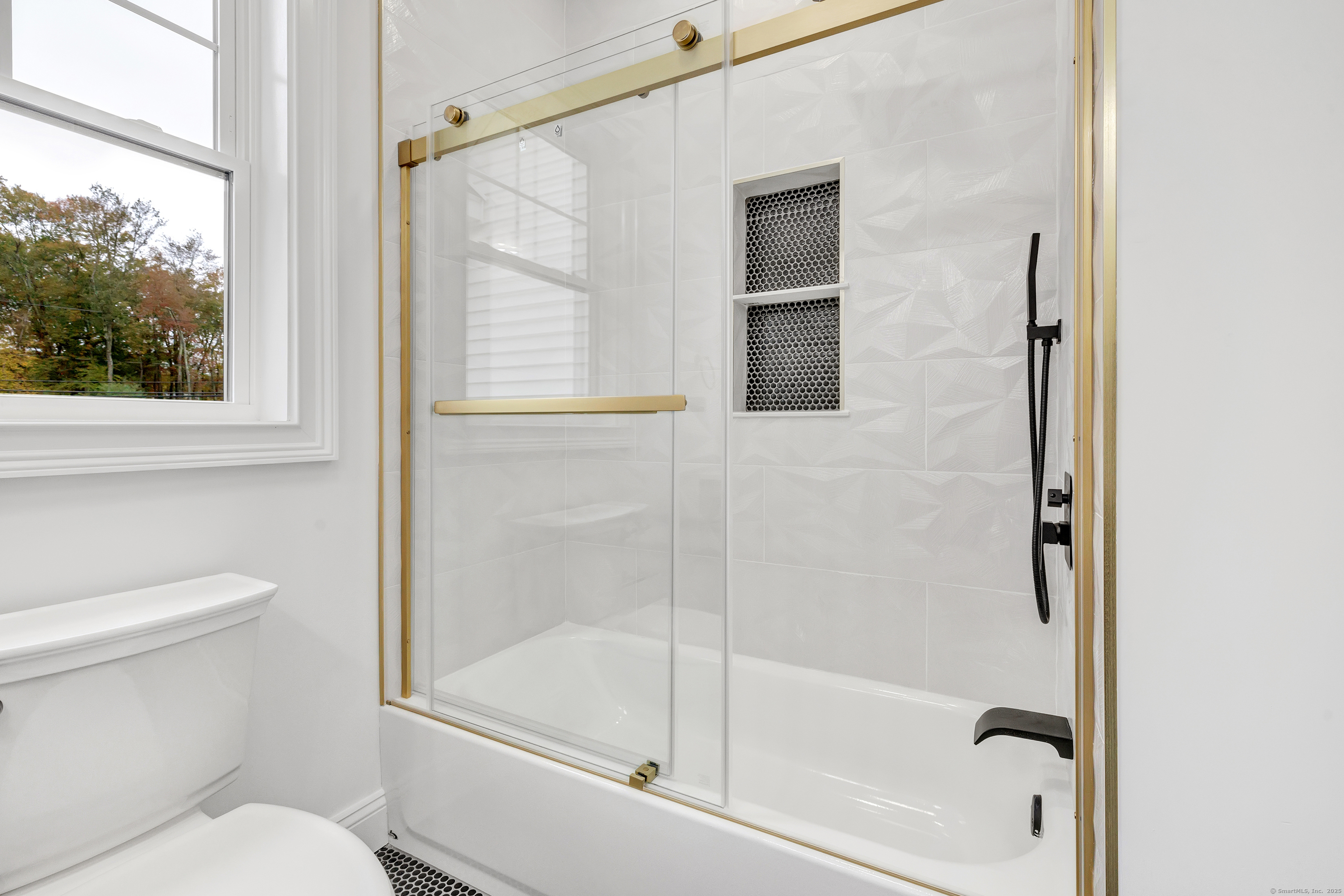 128 Barn Hill Road Monroe, CT 06468 - Photo 30 of 40 a bathroom with a shower and a toilet