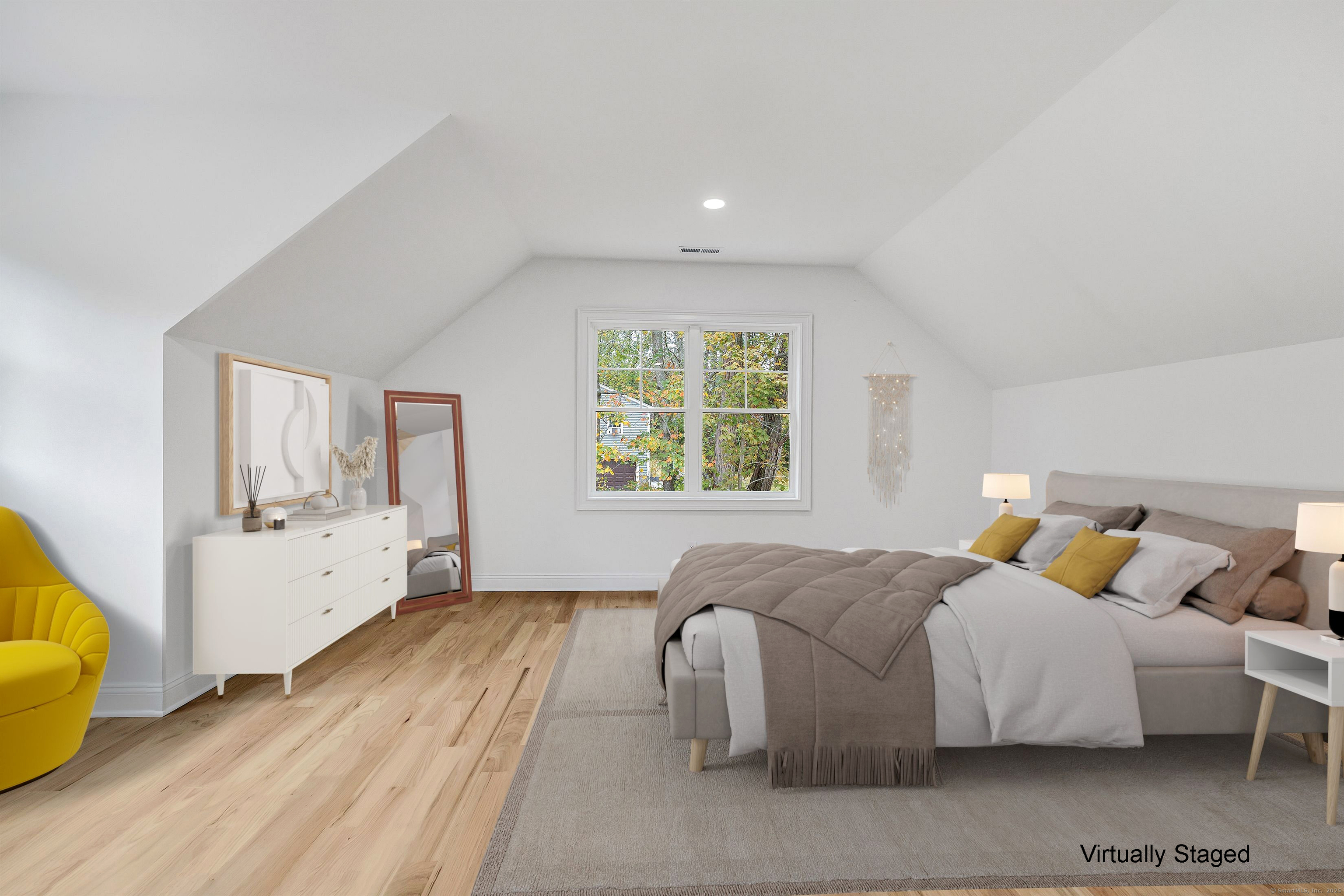 128 Barn Hill Road Monroe, CT 06468 - Photo 33 of 40 a spacious bedroom with a bed and a couch