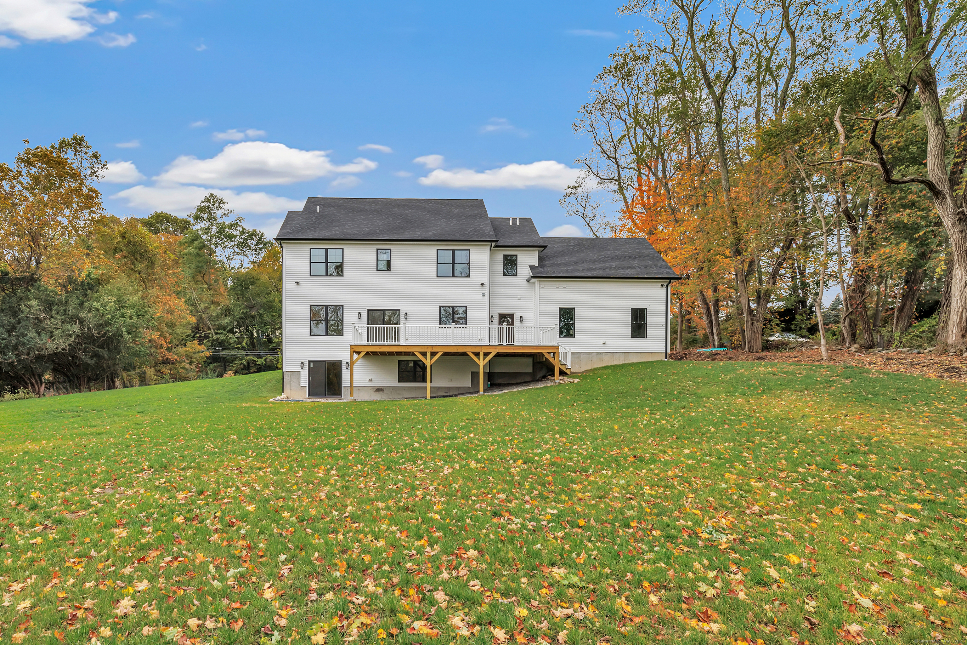 128 Barn Hill Road Monroe, CT 06468 - Photo 37 of 40 a view of a house with a yard