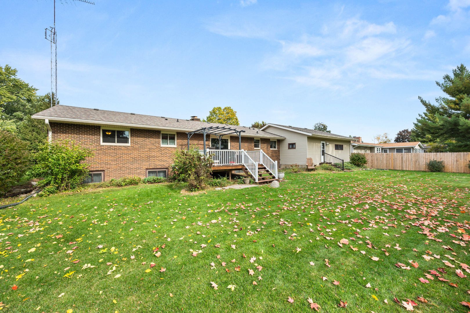 224 Dunkery Drive Sycamore, IL 60178 - Photo 12 of 39 a front view of a house with a garden