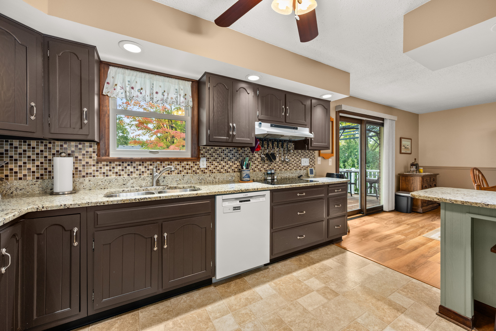 224 Dunkery Drive Sycamore, IL 60178 - Photo 20 of 39 a large kitchen with a lot of counter space and a sink