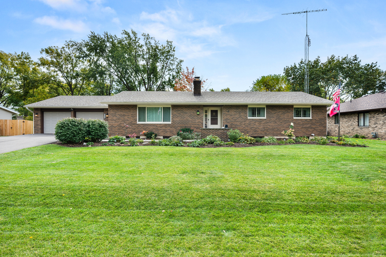 224 Dunkery Drive Sycamore, IL 60178 - Photo 2 of 39 a front view of a house with garden