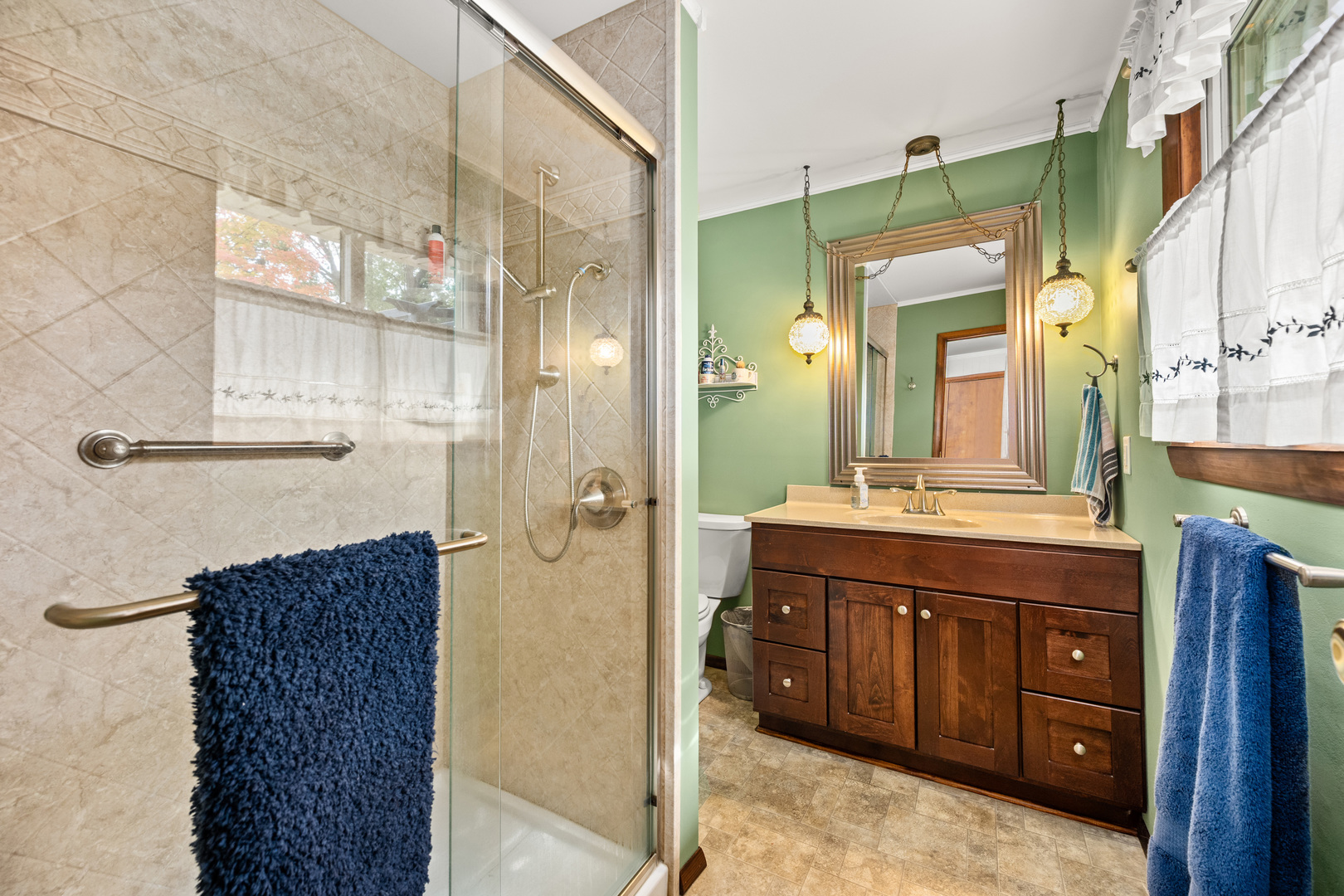 224 Dunkery Drive Sycamore, IL 60178 - Photo 24 of 39 a bathroom with a double vanity sink mirror and shower