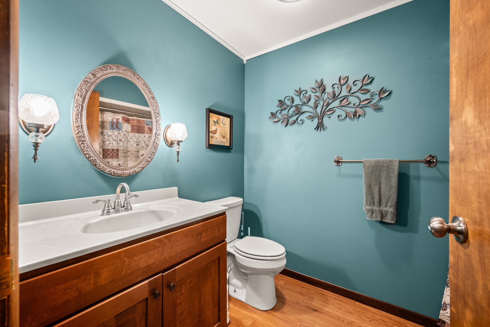 224 Dunkery Drive Sycamore, IL 60178 - Photo 27 of 39 a bathroom with a toilet sink and mirror