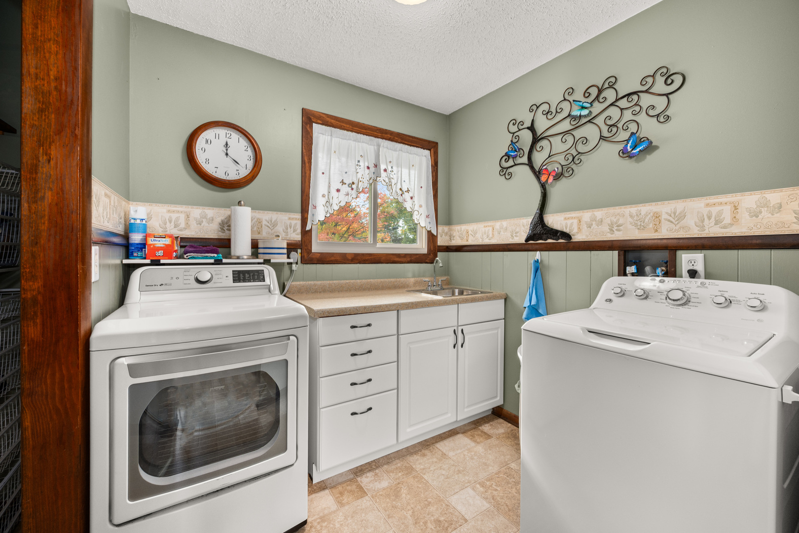 224 Dunkery Drive Sycamore, IL 60178 - Photo 29 of 39 a view of storage and utility room with a stove top oven