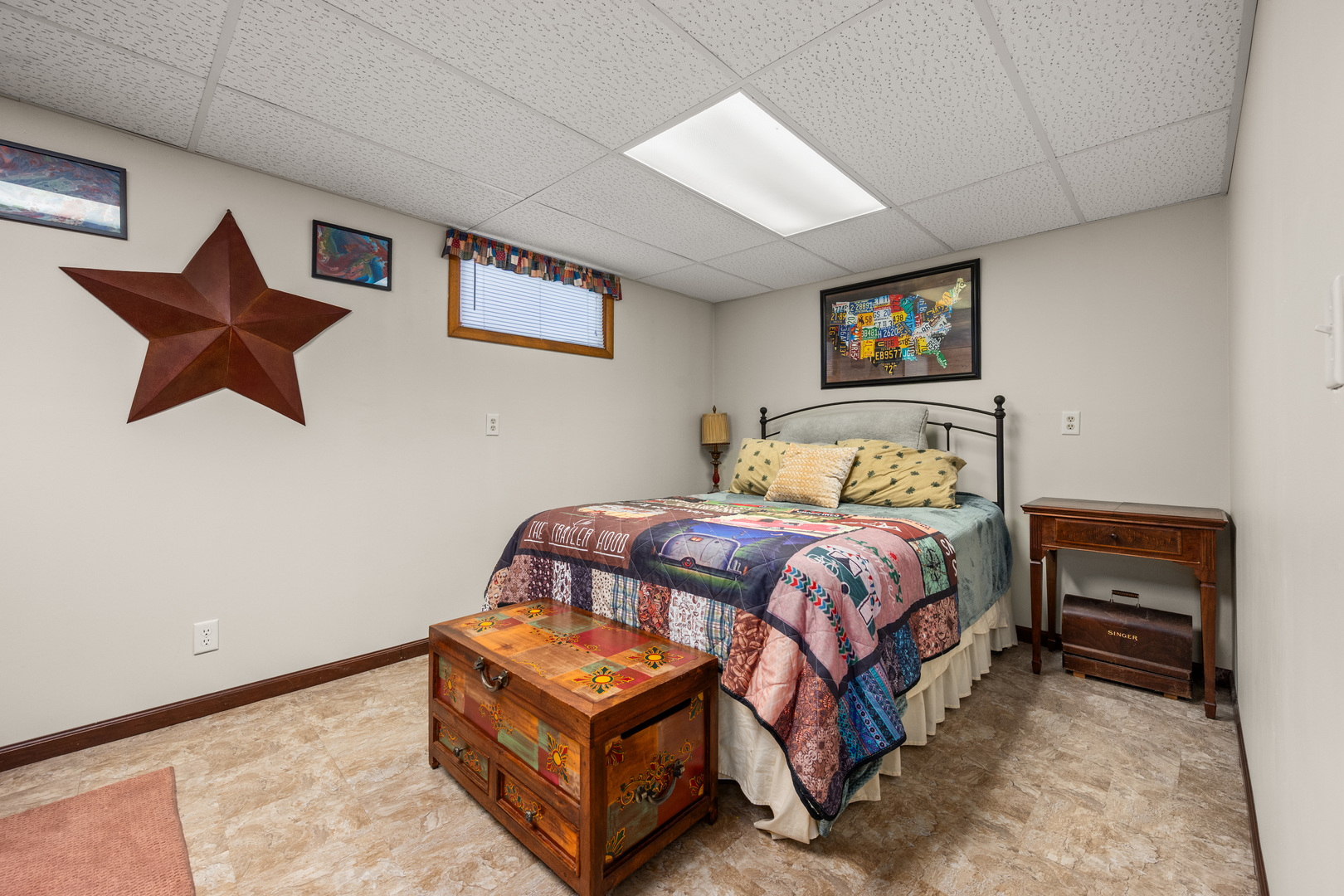 224 Dunkery Drive Sycamore, IL 60178 - Photo 31 of 39 a bedroom with a bed and a painting on the wall