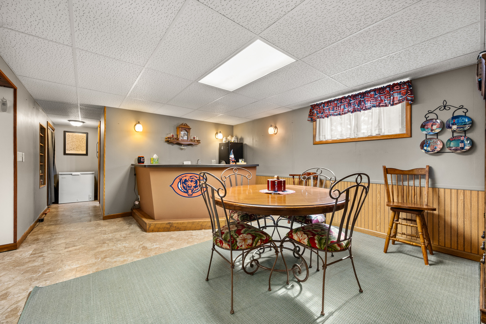 224 Dunkery Drive Sycamore, IL 60178 - Photo 34 of 39 a kitchen with stainless steel appliances kitchen island granite countertop a dining table chairs and a refrigerator