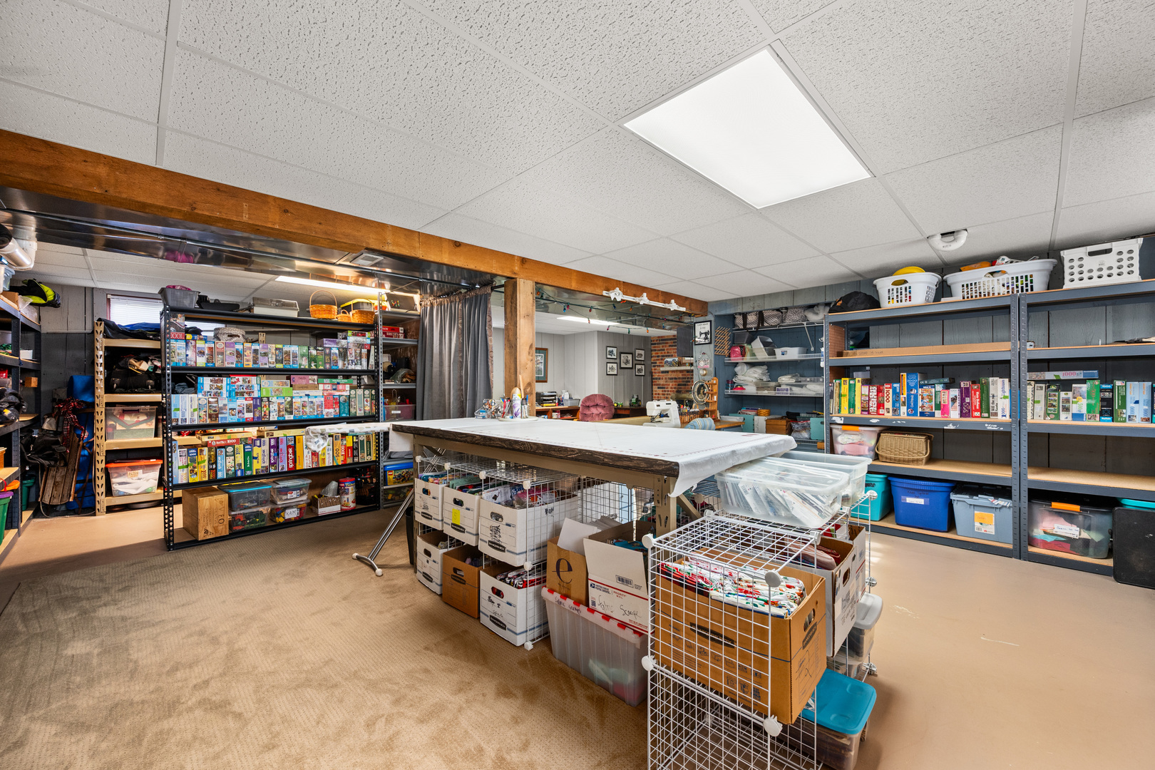 224 Dunkery Drive Sycamore, IL 60178 - Photo 38 of 39 a living room with lots of furniture and a book shelf