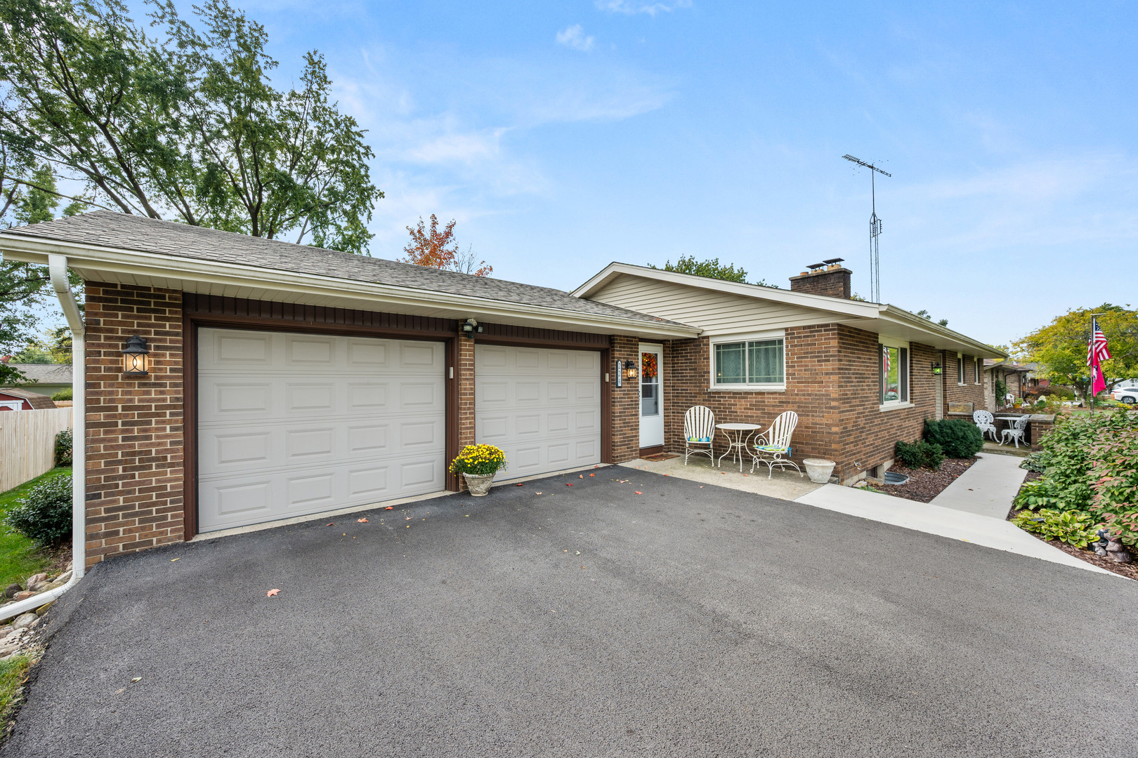 224 Dunkery Drive Sycamore, IL 60178 - Photo 4 of 39 a view of a house with a garage and sitting area