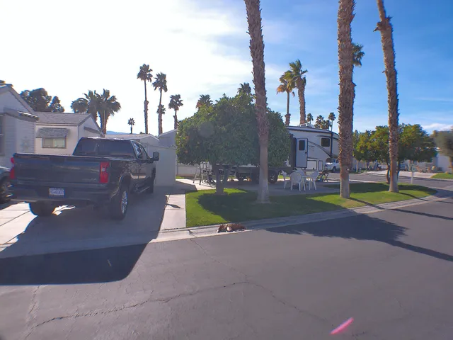 a view of a street with houses