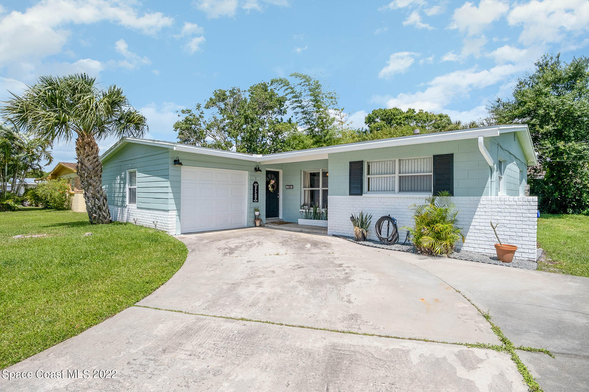 1080 Madrid Road Rockledge, FL 32955 - Photo 1 of 21 a view of a house with a patio