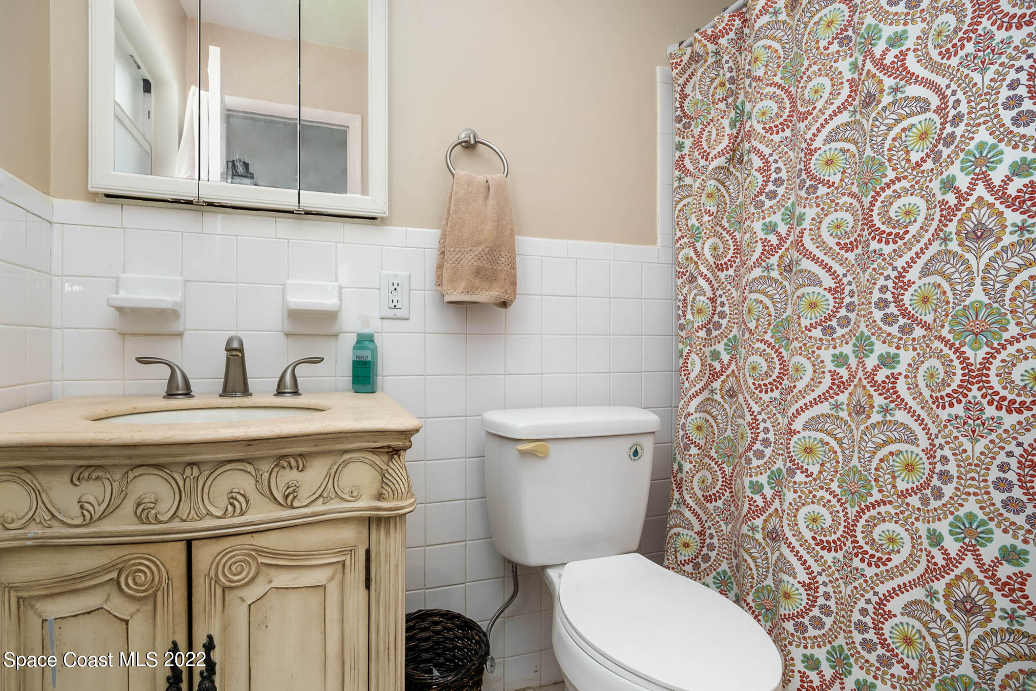 1080 Madrid Road Rockledge, FL 32955 - Photo 12 of 21 a bathroom with a toilet and a sink