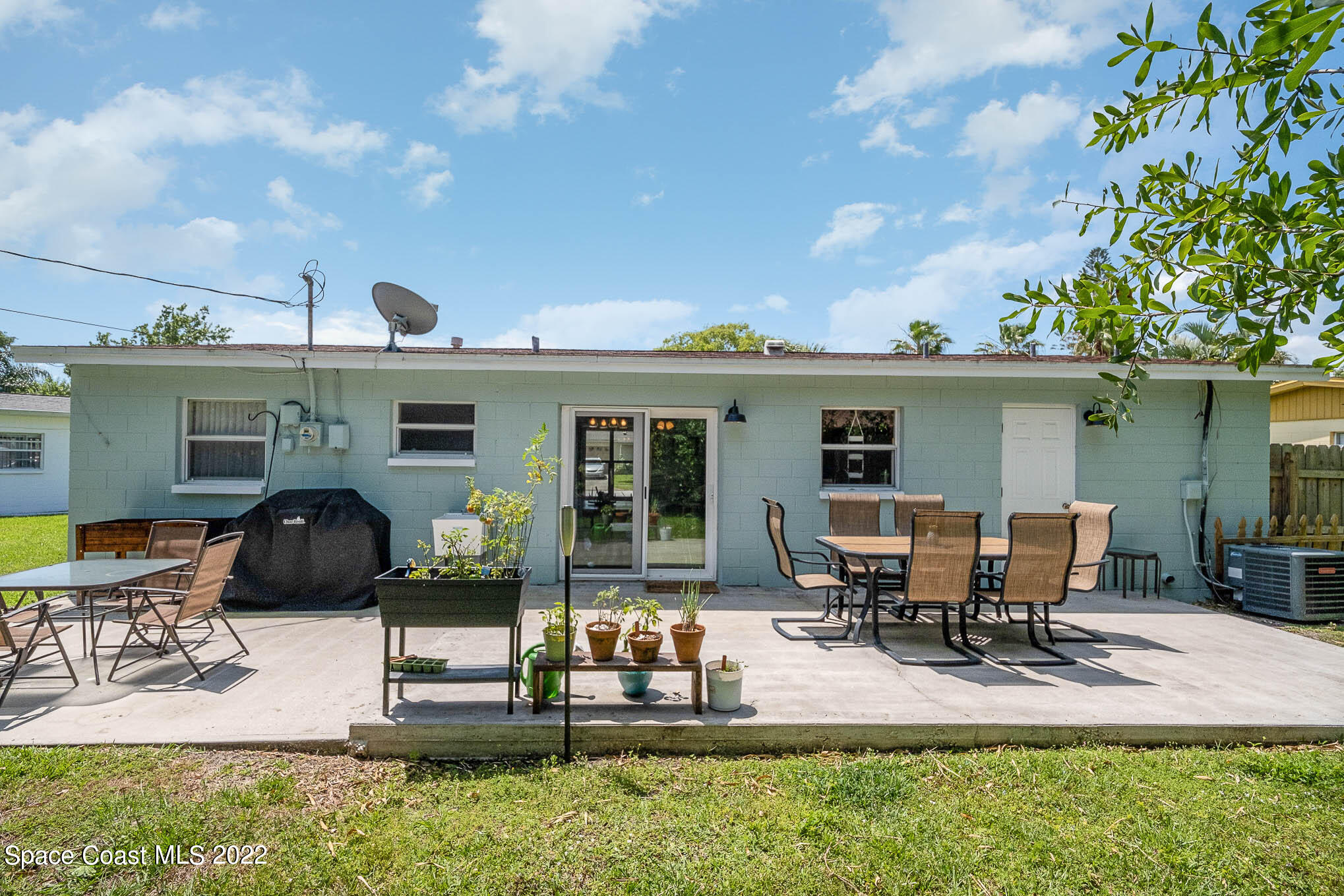 1080 Madrid Road Rockledge, FL 32955 - Photo 16 of 21 a view of a house with patio