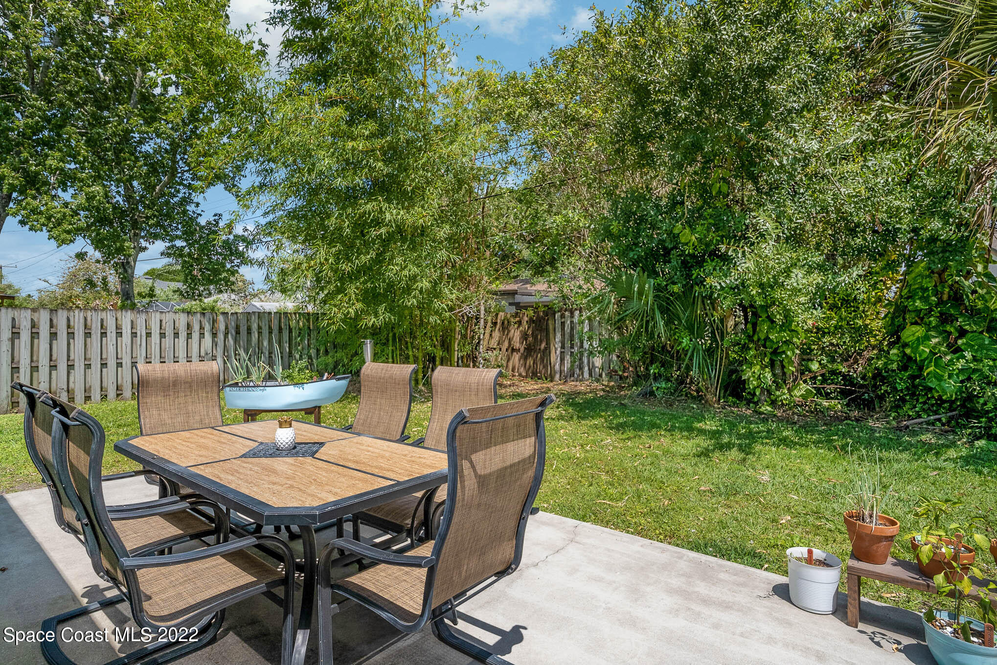 1080 Madrid Road Rockledge, FL 32955 - Photo 18 of 21 a outdoor view with a seating space