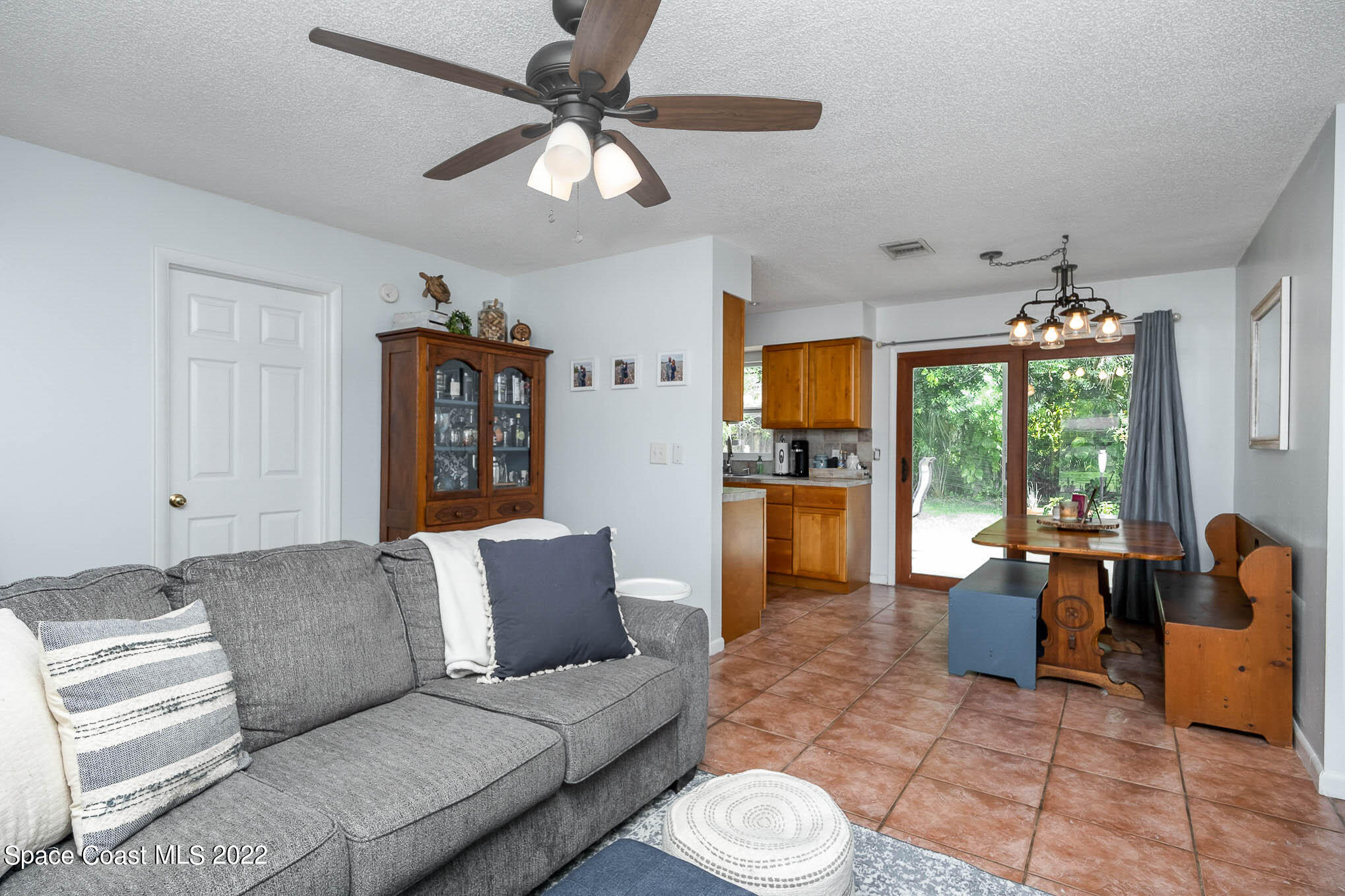 1080 Madrid Road Rockledge, FL 32955 - Photo 5 of 21 a living room with furniture and a large window