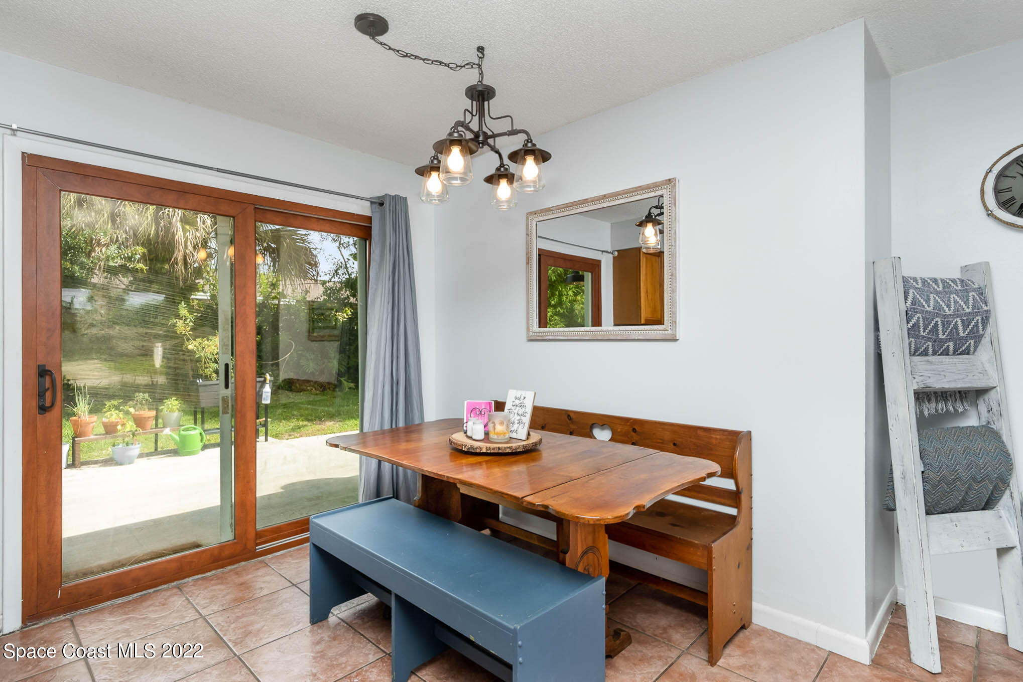 1080 Madrid Road Rockledge, FL 32955 - Photo 6 of 21 a view of a dining room with furniture window and outside view