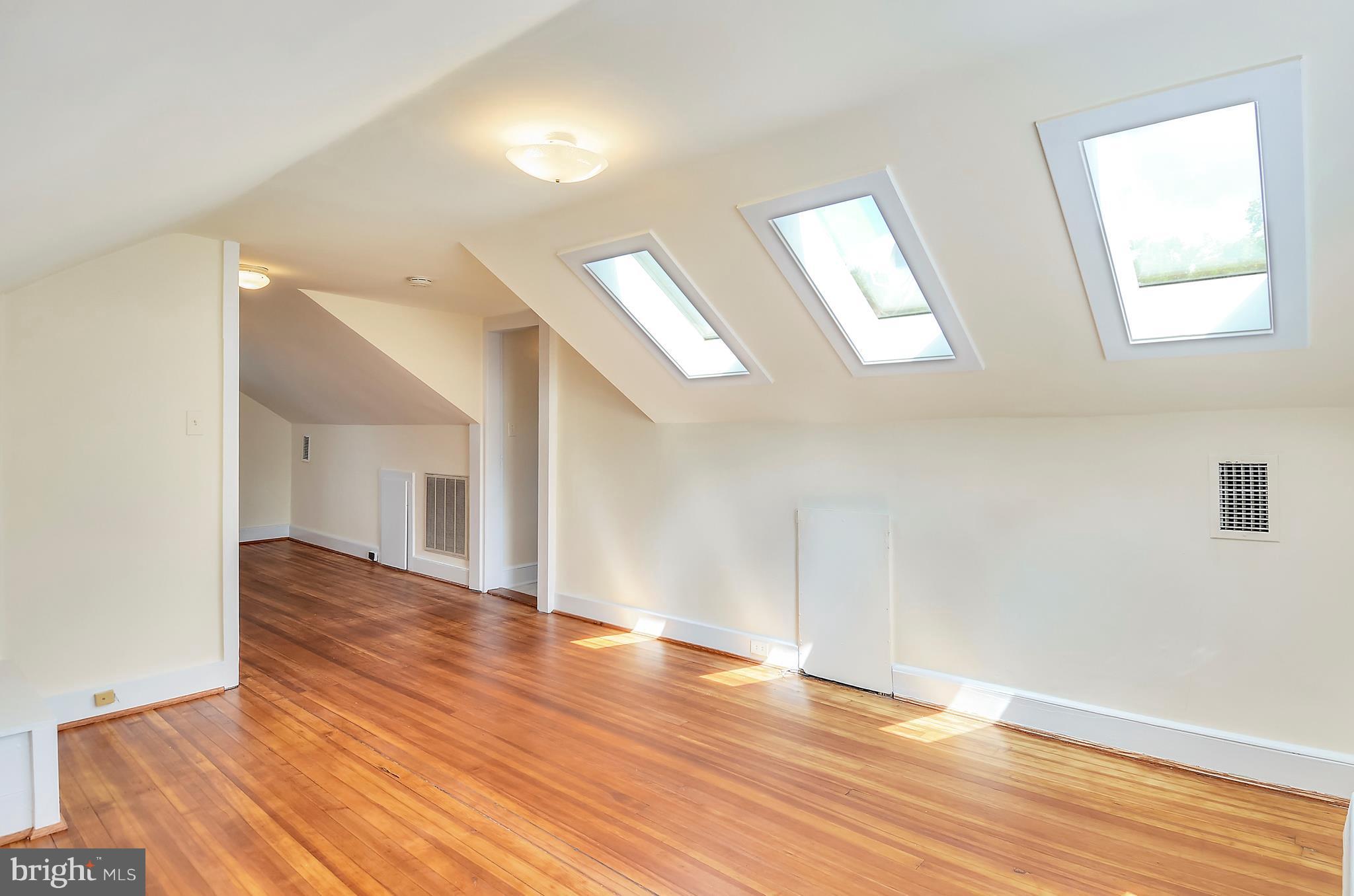 3305 Woodley Road Northwest Washington, DC 20008 - Photo 24 of 30 Attic level bedroom suite with skylights