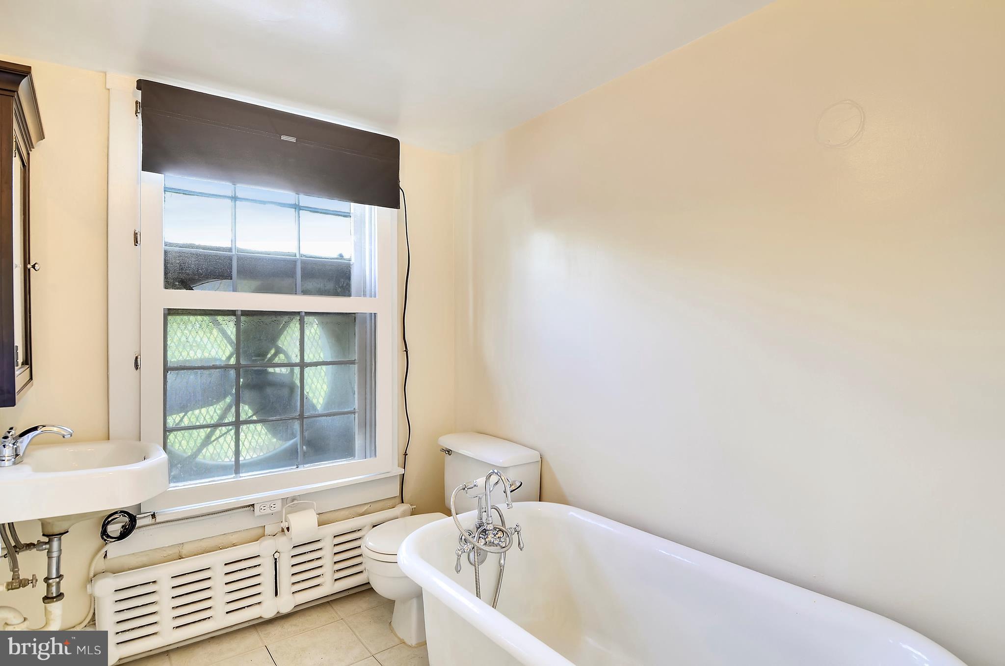 3305 Woodley Road Northwest Washington, DC 20008 - Photo 26 of 30 Attic level full bath + whole house fan