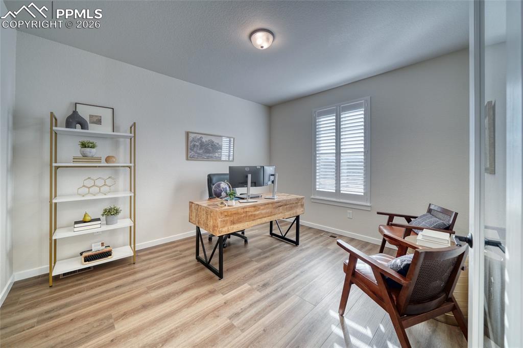 10059 Owl Perch Loop Colorado Springs, CO 80908 - Photo 11 of 50 Office space with baseboards and light wood-style flooring