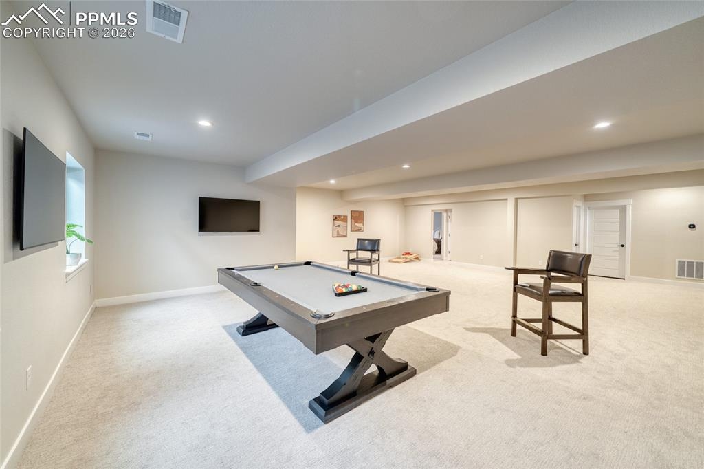 10059 Owl Perch Loop Colorado Springs, CO 80908 - Photo 45 of 50 Recreation room with billiards, light carpet, and recessed lighting